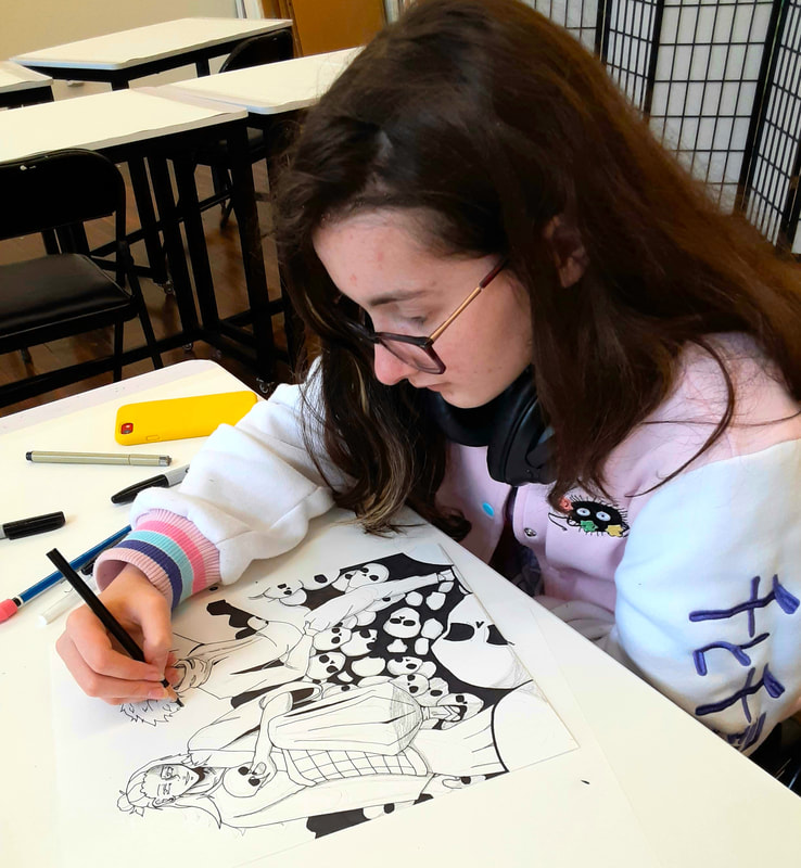 Student drawing in an art class at Catherine Carter Art School, Hatch Street Studios, New Bedford.